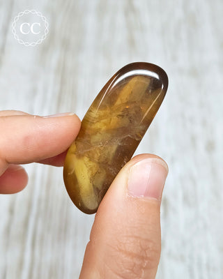 Natural Zambian Citrine Polished Crystal in hand