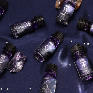 Zodiac Fragrance Oil bottles on a dark background