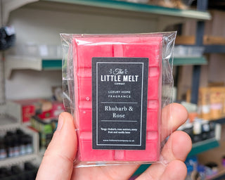 Rhubarb and Rose wax melt bar in hand