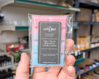 Cherry Blossom and Nordic Cotton wax melt in hand 