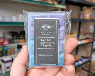 Fairy Silk Tree Blossom and Jasmine wax melt bar in hand