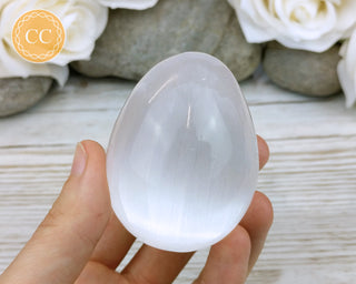 Large Satin Spar (Selenite) Egg in hand