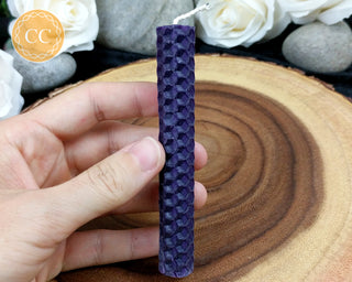 Purple Rolled Beeswax Candle in hand