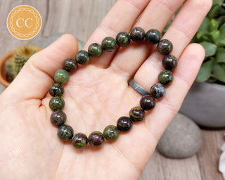 Dragons Blood Jasper 8mm Beaded Bracelet in hand