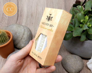 Ivory Beeswax Candle Box of 6 in hand