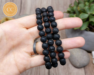 Lava Bead 8mm Bracelet in hand