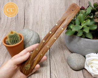 Long Wooden Incense Stick Holder in hand
