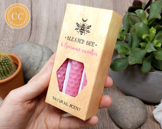 Pink Beeswax Candles Box of 6 in hand