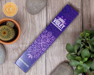 Shree Violet Incense sticks on wooden background